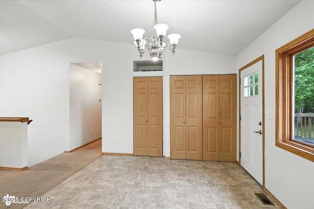 840 N Voss Cir, Wasilla, AK 99623 - entryway featuring lofted ceiling and a chandelier