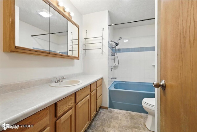 840 N Voss Cir, Wasilla, AK 99623 - bathroom featuring vanity, bathtub / shower combination, and a textured ceiling