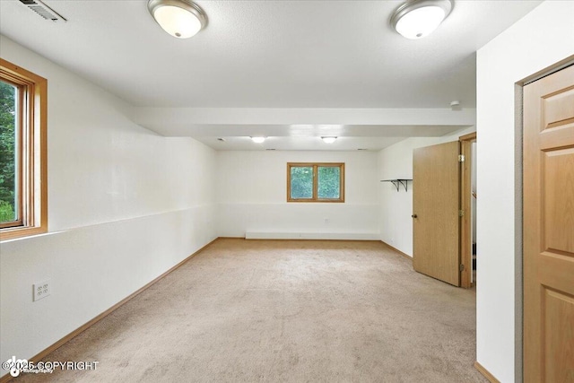 840 N Voss Cir, Wasilla, AK 99623 - basement with light carpet and baseboards