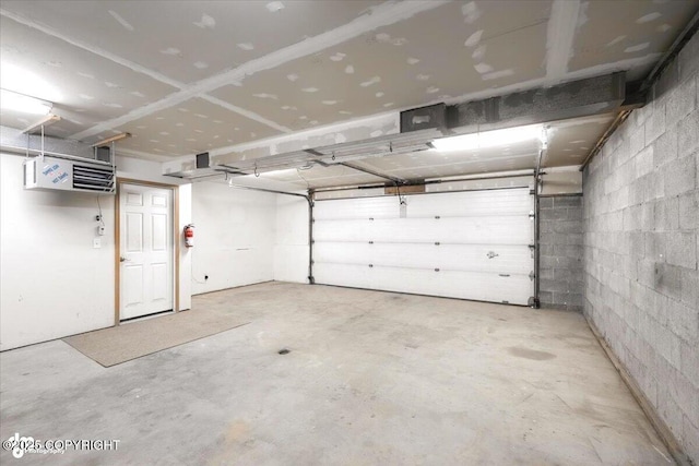 840 N Voss Cir, Wasilla, AK 99623 - garage with concrete block wall