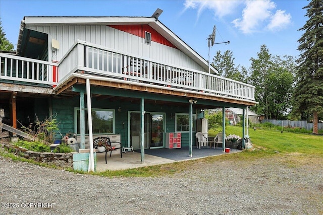 35485 Bluff Ct, Sterling, AK 99672 - back of house featuring a deck and a patio