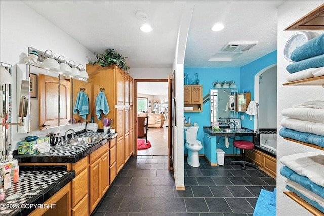 35485 Bluff Ct, Sterling, AK 99672 - bathroom featuring recessed lighting and vanity