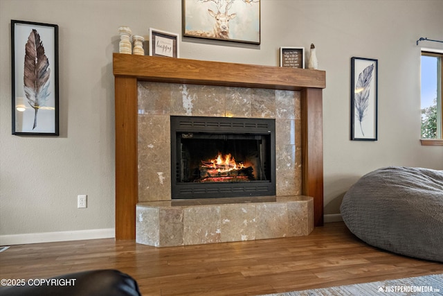 5170 Merle Cir, Anchorage, AK 99507 - detailed view of a tile fireplace and wood finished floors
