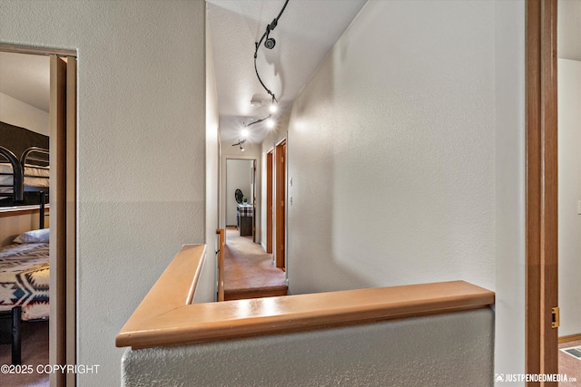 5170 Merle Cir, Anchorage, AK 99507 - corridor featuring a textured wall