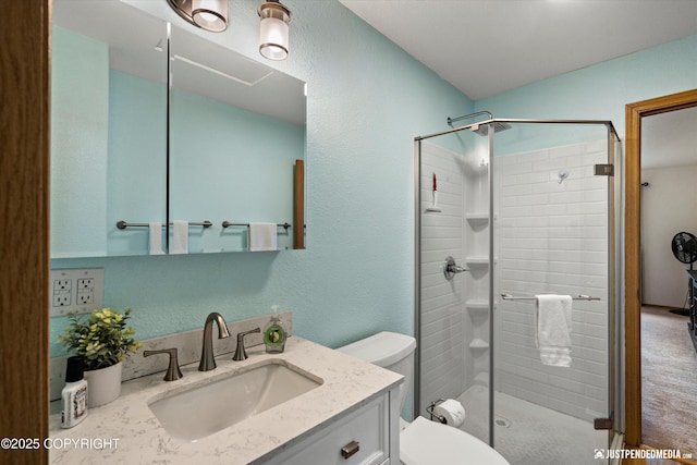 5170 Merle Cir, Anchorage, AK 99507 - full bathroom with a stall shower, vanity, and a textured wall