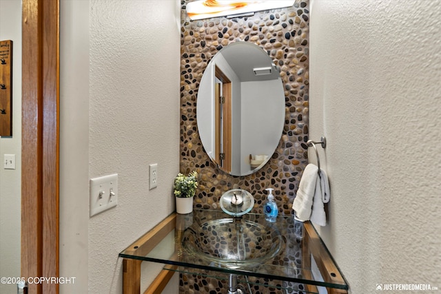 5170 Merle Cir, Anchorage, AK 99507 - bathroom featuring a textured wall and a sink