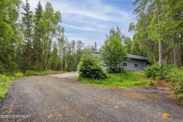 9601 Carlson Rd, Anchorage, AK 99507 - view of dirt / gravel road