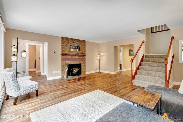 9601 Carlson Rd, Anchorage, AK 99507 - living area featuring stairs and light wood-type flooring
