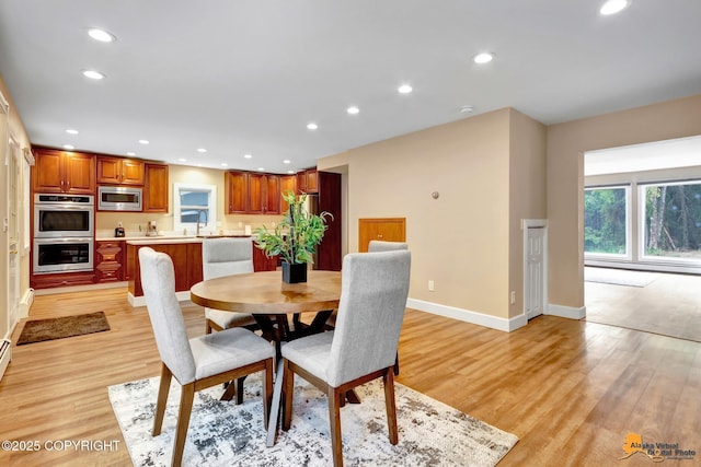 9601 Carlson Rd, Anchorage, AK 99507 - dining area featuring recessed lighting and light wood-style floors
