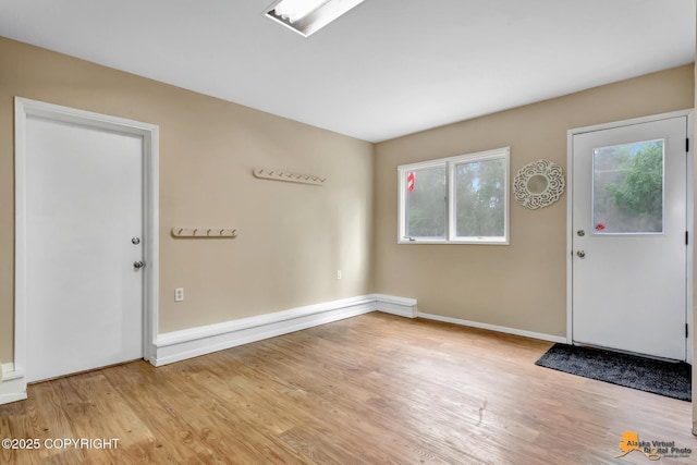 9601 Carlson Rd, Anchorage, AK 99507 - foyer entrance with light wood-style floors