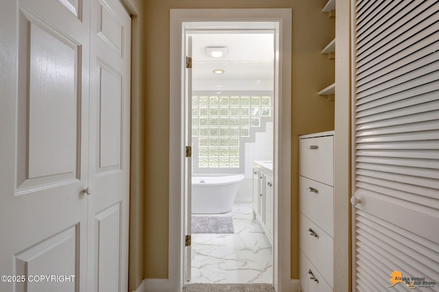 9601 Carlson Rd, Anchorage, AK 99507 - hall with light marble finish floors and baseboards
