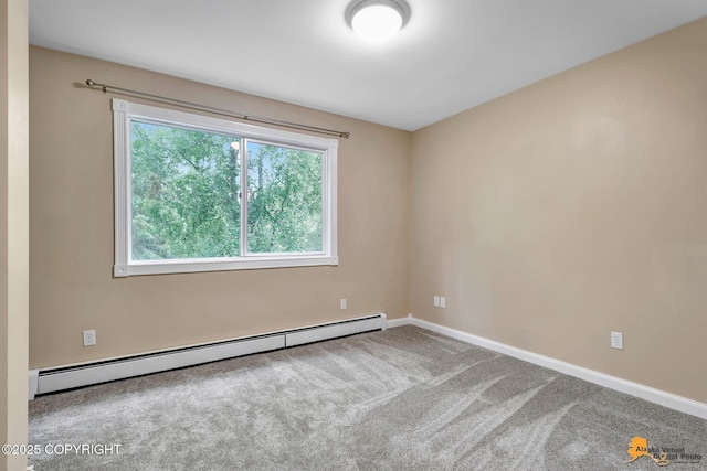9601 Carlson Rd, Anchorage, AK 99507 - empty room featuring a baseboard heating unit and carpet floors