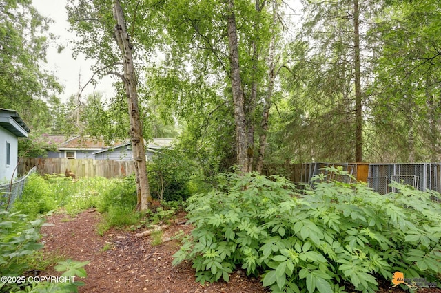 9601 Carlson Rd, Anchorage, AK 99507 - view of fenced backyard
