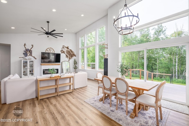 3200 E Woodruff Loop, Wasilla, AK 99654 - dining room featuring recessed lighting, wood finished floors, a chandelier, and ceiling fan