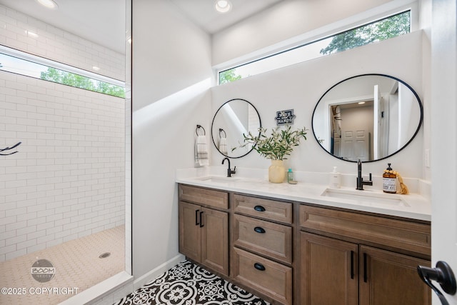 3200 E Woodruff Loop, Wasilla, AK 99654 - full bathroom featuring double vanity, a tile shower, and recessed lighting