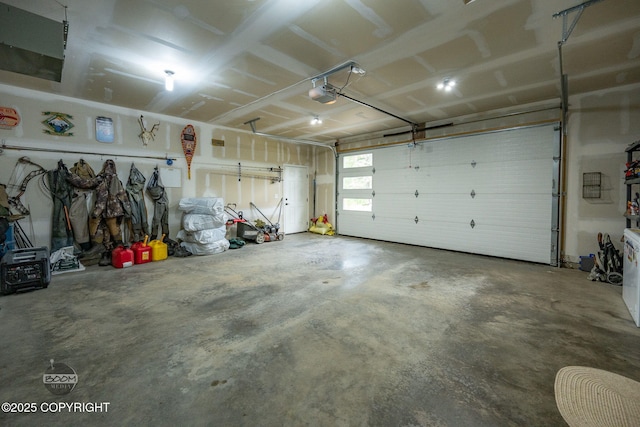 3200 E Woodruff Loop, Wasilla, AK 99654 - garage featuring a garage door opener
