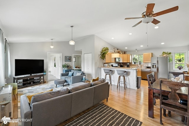 196 W Fairview Ave, Homer, AK 99603 - living area with light wood-style flooring, a ceiling fan, lofted ceiling, and recessed lighting