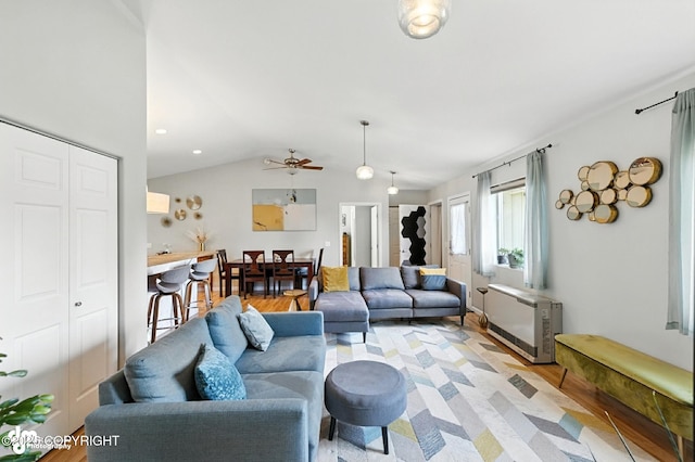 196 W Fairview Ave, Homer, AK 99603 - living room with a ceiling fan, lofted ceiling, and light wood-type flooring