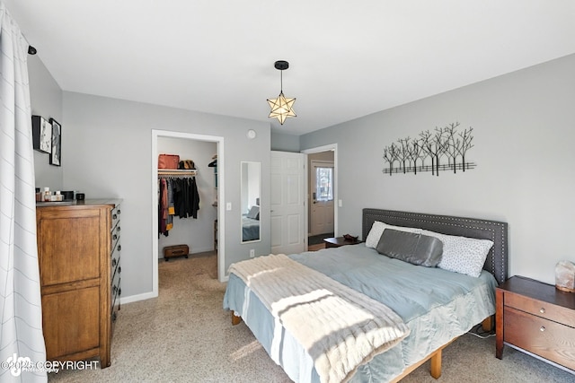 196 W Fairview Ave, Homer, AK 99603 - bedroom with a spacious closet and light carpet