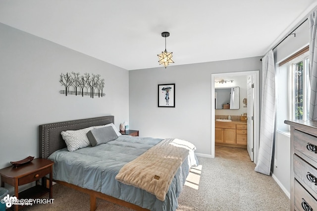 196 W Fairview Ave, Homer, AK 99603 - bedroom with light colored carpet and ensuite bathroom