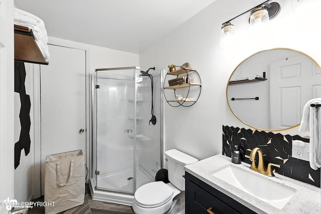 196 W Fairview Ave, Homer, AK 99603 - bathroom with vanity, a stall shower, and tasteful backsplash