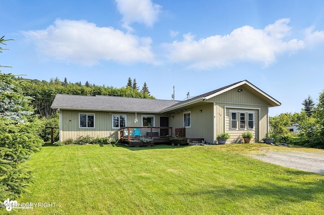 196 W Fairview Ave, Homer, AK 99603 - ranch-style home with a deck and a front yard