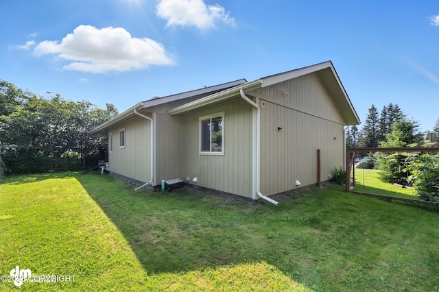 196 W Fairview Ave, Homer, AK 99603 - view of home's exterior with a lawn