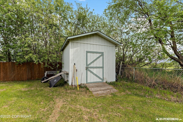 13693 E Guernsey Ln, Palmer, AK 99645 - view of shed with a fenced backyard