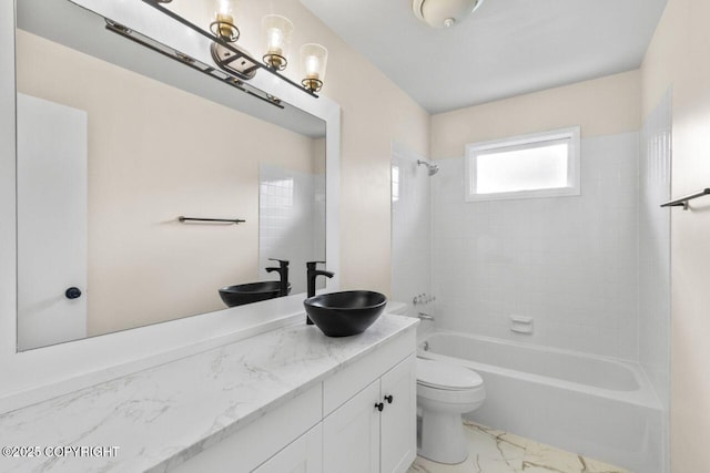 3340 Rose St, Anchorage, AK 99508 - full bath featuring vanity, shower / bathtub combination, and marble finish floors
