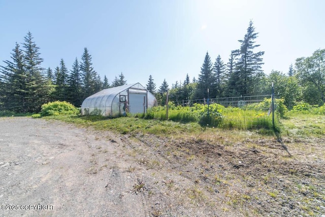 17751 Arcturus Loop, Ninilchik, AK 99639 - view of yard with an exterior structure and an outdoor structure