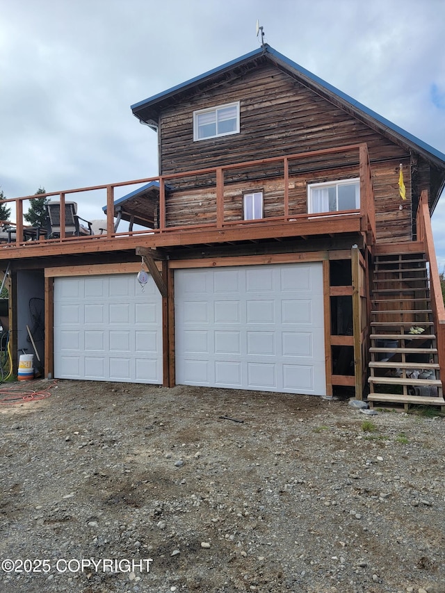 17751 Arcturus Loop, Ninilchik, AK 99639 - view of home's exterior with stairs, a garage, and driveway
