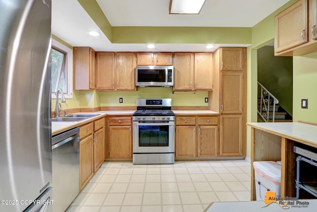 4023 Apollo Dr, Anchorage, AK 99504 - kitchen featuring appliances with stainless steel finishes, light countertops, recessed lighting, and light tile patterned floors