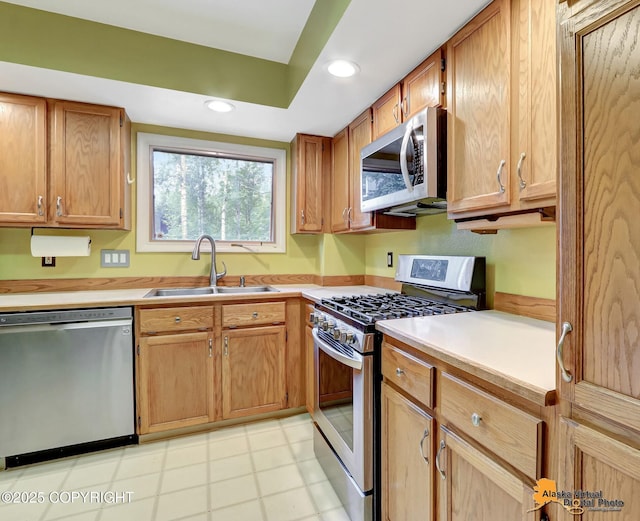 4023 Apollo Dr, Anchorage, AK 99504 - kitchen featuring stainless steel appliances, light countertops, recessed lighting, and light floors