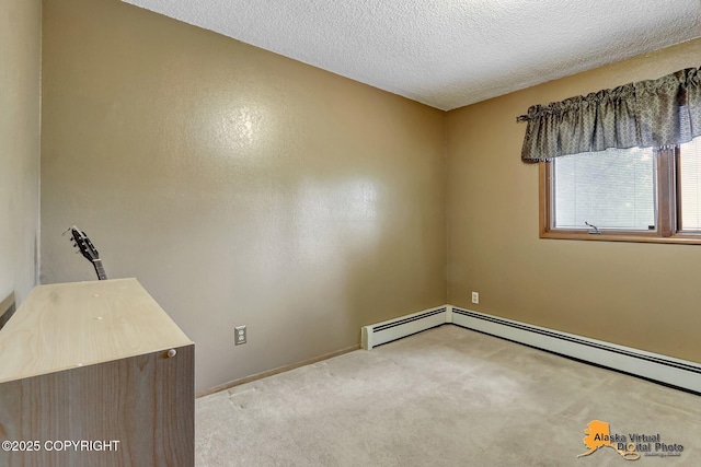 4023 Apollo Dr, Anchorage, AK 99504 - unfurnished room with carpet flooring, a textured ceiling, and baseboard heating