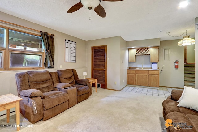 4023 Apollo Dr, Anchorage, AK 99504 - living area featuring wet bar, ceiling fan, stairs, light carpet, and light tile patterned floors