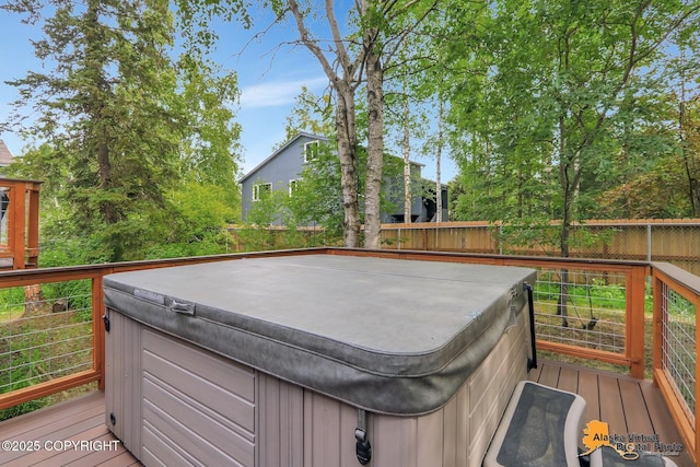 4023 Apollo Dr, Anchorage, AK 99504 - wooden terrace featuring a hot tub and a fenced backyard