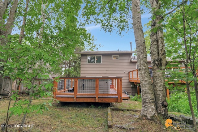 4023 Apollo Dr, Anchorage, AK 99504 - rear view of house with a deck
