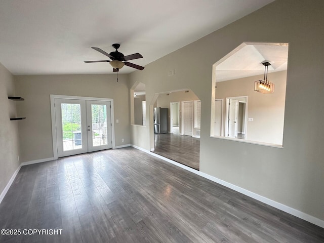 5705 Felix Cir, Homer, AK 99603 - unfurnished room featuring vaulted ceiling, wood finished floors, ceiling fan, and french doors