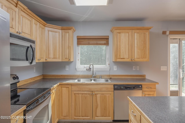 1250 Toolik Dr, North Pole, AK 99705 - kitchen featuring appliances with stainless steel finishes and light brown cabinetry