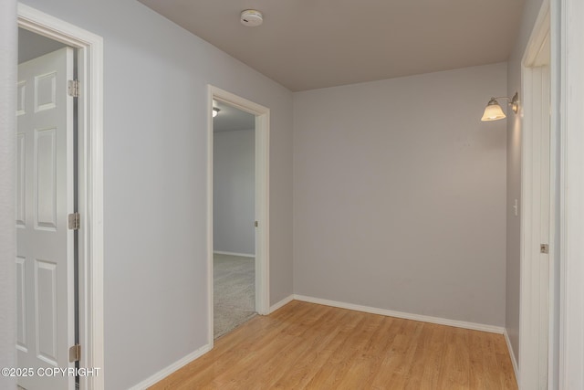 1250 Toolik Dr, North Pole, AK 99705 - spare room featuring a smoke detector and light wood-style floors