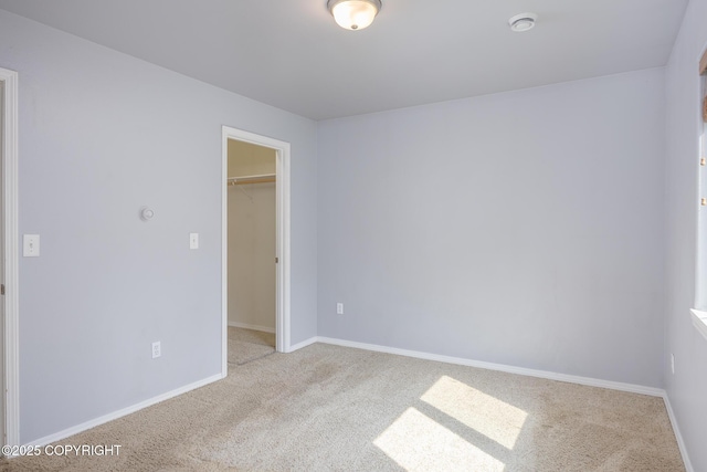 1250 Toolik Dr, North Pole, AK 99705 - carpeted spare room featuring a smoke detector and baseboards