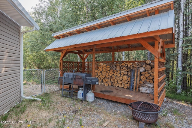 1250 Toolik Dr, North Pole, AK 99705 - view of patio / terrace featuring a gate, an outdoor fire pit, and a gazebo