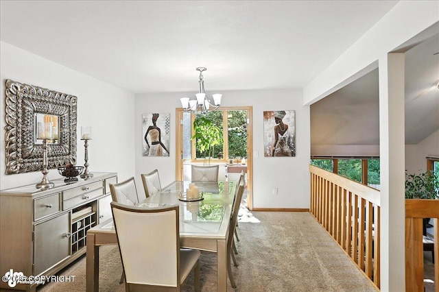 6712 Lunar Dr # K2, Anchorage, AK 99504 - carpeted dining space with a chandelier and healthy amount of natural light