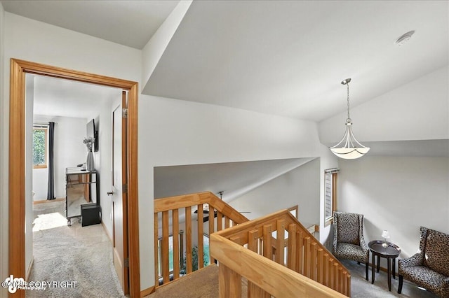6712 Lunar Dr # K2, Anchorage, AK 99504 - hallway with an upstairs landing, carpet floors, and vaulted ceiling