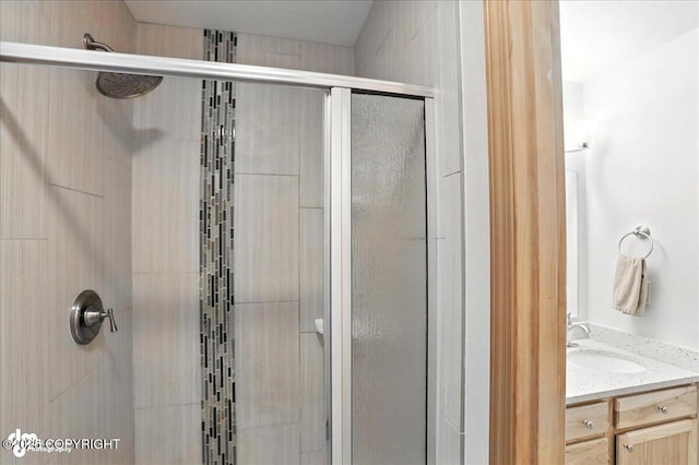 6712 Lunar Dr # K2, Anchorage, AK 99504 - bathroom featuring a stall shower and vanity