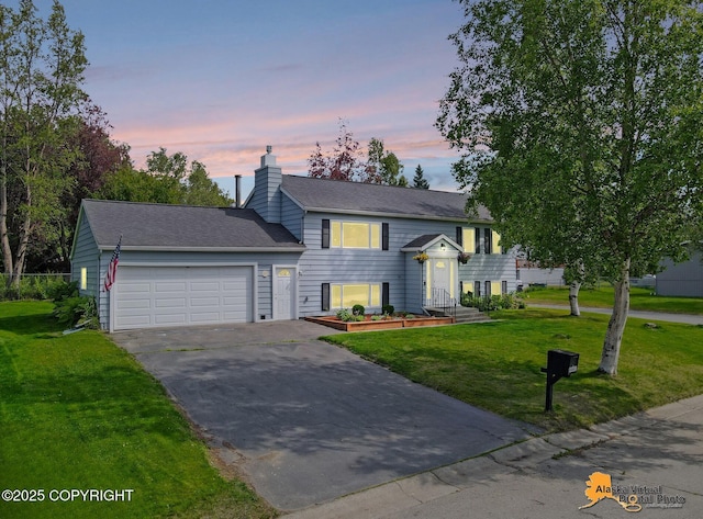 8461 Greenhill Way, Anchorage, AK 99502 - view of front of property with asphalt driveway, a garage, a front yard, a chimney, and a shingled roof