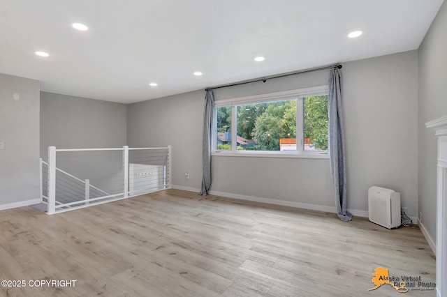 8461 Greenhill Way, Anchorage, AK 99502 - spare room featuring recessed lighting and wood finished floors