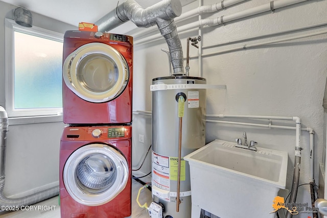 8461 Greenhill Way, Anchorage, AK 99502 - washroom with gas water heater and stacked washing machine and dryer