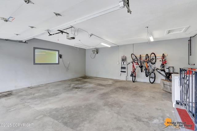 8461 Greenhill Way, Anchorage, AK 99502 - garage featuring a garage door opener