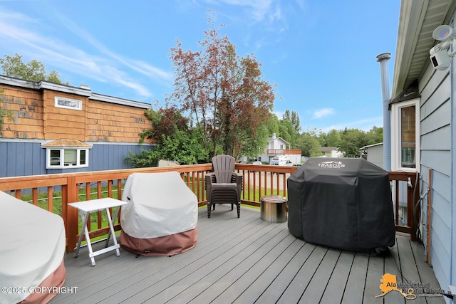 8461 Greenhill Way, Anchorage, AK 99502 - wooden terrace featuring a grill